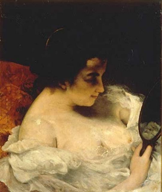 The woman looking at herself in the small mirror - Gustave Courbet