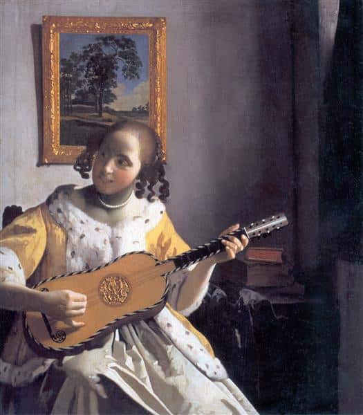 A woman playing the guitar - Johannes Vermeer